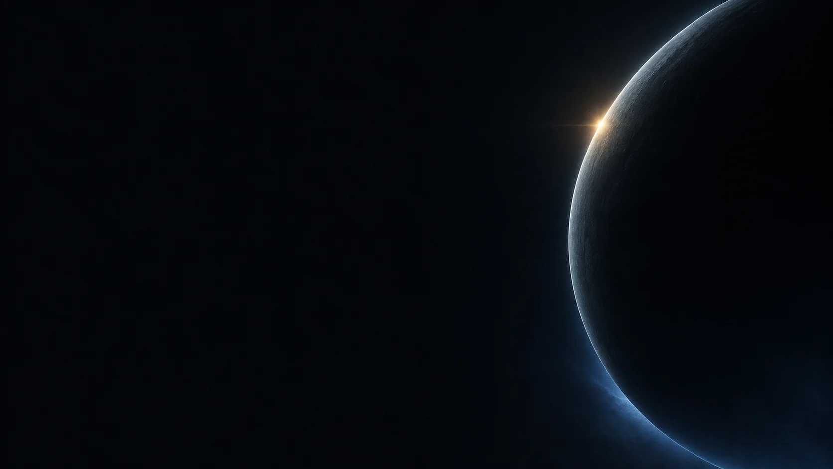 Dawn breaking along the edge of a planet